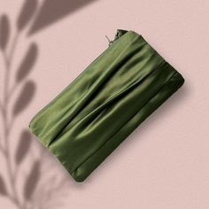 "Olive green wedding clutch wristlet. Available in two sizes. The regular size (4'x 8\") fits your cell phone and a few small items such as a lipstick and a compact powder. The larger size (10\"x5\") fits a small wallet, a cell phone, and a few make-up items. Dimension: Regular: 4\"X8\" Large: 5\"x 10\" Pleated detail on the front Fabric: satin  Made in the USA ** If ordered with name/ message inscription: Please note your inscription in the personalization box. ** If ordered with a photo lining Rectangular Clutch With Zipper Pouch For Formal Events, Rectangular Clutch With Zipper Pouch For Formal Occasions, Formal Rectangular Clutch With Zipper Pouch, Elegant Rectangular Pouch With Zipper, Green Rectangular Evening Bag For Events, Green Rectangular Clutch For Events, Elegant Clutch With Zipper Pouch For Formal Events, Rectangular Evening Wristlet, Elegant Clutch With Cell Phone Pocket