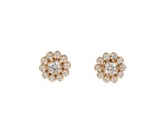 These Sophie Bille Brahe earrings offer a playful, feminine alternative to traditional diamond posts. The round white diamonds are bezel set in 18K yellow gold to create the petals which encircle the diamond center. They connect to 18K yellow gold posts and would even look good worn in second or third piercings.18K yellow gold studs : 5/16" diameterwhite diamonds : vary : 2mm diameter to 4mm diameter each : .60cttw18K yellow gold post backs Gold Cluster Earrings With Rose Cut Diamonds, Round Yellow Gold Cluster Earrings With Single Cut Diamonds, Sophie Bille Brahe, Traditional Diamond, Best Wear, White Diamonds, Gold Studs, Bezel Setting, Diamond White