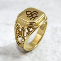 The initial signet ring is a classic piece of jewelry for both men and women. Bring a little bling with this unique square-shaped initial signet ring in 14k gold with your choice of initial letters made especially for you. The monogram seal ring is polished to a high finish and decorated with a delicate ornamental design that will certainly be noticed as a refreshing element in any day or night outfit. This monogram ring is a perfect gift for a birthday, anniversary, as bridesmaid's gift or for Gold Classic Signet Ring For Promise, Classic Gold Signet Ring For Promise, Classic 14k Stamped Signet Ring For Promise, Classic 14k Stamped Promise Signet Ring, Antique Initial Ring With Engraving Option Gift, Classic Initial Promise Ring, Classic Engraved Initial Promise Ring, Personalized Vintage Signet Ring For Promise, Symbolic Initials Signet Ring For Anniversary