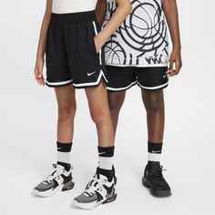 From layup drills at home to pickup games in the park with your friends, you can do it all in these roomy basketball shorts. Powered by a comfortable knit fabric that pulls sweat away from your skin, they help you stay cool and focused through every dribble. Plus, a zippered pocket helps keep small essentials secure as you run down the court to make your next slam dunk. Oversized Basketball Shorts, Black Basketball Shorts, Moisture-wicking Basketball Athletic Shorts, Boys Basketball Shorts, Sporty Moisture-wicking Basketball Shorts, Slam Dunk, Basketball Shorts, Black White Fashion, Nike Dri Fit