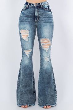 These Bell Bottom Jeans are crafted with a premium soft stretch fabric for superior comfort and style. Featuring 34" inseam length, frayed hem detail, rip details, front and back pockets, and made in USA, these jeans will give any outfit an on-trend and timeless look. Made in USA98% Cotton, 2% SpandexModel is wearing size 3True to size Silhouette: bell bottom Length: Full Length Closure: zipper, button Made In: USAFabric Contents: 98% Cotton, 2% Spandex Stretch fabric Non-sheer fabric Care Instr Biker Shirts, Bottom Jeans, Leather Denim, Lady Biker, Leather Motorcycle Jacket, Biker Style, Sheer Fabric, Bell Bottom, Country Outfits