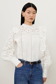 Go Seamlessly From Day To Night In Our Woven Shirt, With Cutwork Detailing Adorning The Sleeves, Chest, And Back, As Well As Ruffles Running Down The Sides. Presented With Long Sleeves That Are Fitted Around The Wrist And A High Neckline, Style With Tailored Trousers For Smart Workwear That Works Just As Well For After-Work Drinks Embroidery Cutwork Frill Detail Woven Shirt High Quality, Embroidered Fabric Flattering Straight Fit Formal High Neckline Unique Cutwork Detailing Statement Ruffle Acc Katun Bordir, Ivory Embroidery, Hen Do Outfits, Workwear Capsule Wardrobe, Workwear Capsule, Outfits For Mexico, Spring Wedding Guest Dress, Petite Business Casual, Ibiza Outfits