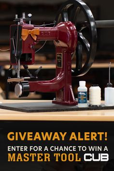 a red sewing machine with the words giveaway alert enter for a chance to win a master tool club