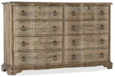 an old wooden dresser with many drawers