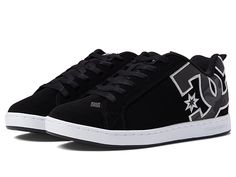 DC Court Graffik W - Women's Skate Shoes : Black Camo 1 : A modern classic, the DC Court Graffik W casual shoes deliver with a clean silhouette and bold logo detail. Casual sneakers with heavy-duty suede, sturdy action nubuck, or soft and resilient action leather upper for abrasion-resistance and durability. Foam-padded tongue and collar for added comfort and support. Textile lining offers breathability. Internal elastic tongue holders for added foot stability. Rubber cupsole with iconic pill pa Urban Skate Shoes With Fade-resistant Round Toe, Modern Low-top Skate Shoes For Skateboarding, Modern Low-top Skate Shoes, Suede Sneakers With Embossed Logo For Streetwear, Fade-resistant Lace-up Skate Shoes, High-top Fade-resistant Skate Shoes For Skateboarding, High-top Fade-resistant Skate Shoes, Fade-resistant High-top Skate Shoes For Skateboarding, Classic Fade-resistant Sneakers For Streetwear