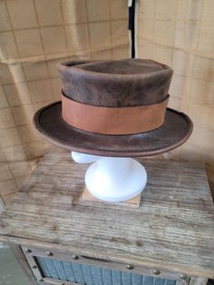 Handmade all natural veg-tanned leather top hat. Hand stitched with wax thread. Please contact me with any questions or custom orders. please put your head measurements in the personalization. Leather Top Hat, Brown Leather Top, Costume Hats, Top Hat, Leather Top, Your Head, Hand Stitched, Costume Accessories, Hand Stitching