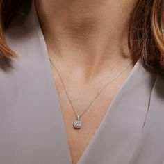 Our Zoey necklace is beautifully crafted in 9 carat white gold and set with 0.33ct of lab grown diamond. This elegant cushion shape pendant is set with a lab grown diamond centre stone framed by a halo of pavé set diamonds. Our Zoey necklace is partnered with an 18 inch gold chain. Product Information Metal Height Width Certificate 9ct gold 12.1 7.1 Authenticity Certificate Lab Grown Diamond Information Total Carat Weight Colour Clarity Shape 0.33ct G VS2 Round Calvin Klein Jewelry, Stackers Jewellery, Authenticity Certificate, White Gold Chains, Mens Jewelry Necklace, Halo Pendant, Cushion Diamond, Diamonds And Gold, Yellow Gold Chain