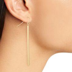 These rangy bars of polished metal dangle from your ears -- sleek and sassy. They look substantial but they’re so lightweight! Straight, unbendable lines generate just the right touch of sophistication for any occasion. PRODUCT DETAILS:Materials: Pewter metal plated with 24 kt gold / sterling silver / rose gold.Measurements: 2.5" longEarrings closure: French wireFeather weight: 0.08 oz Sleek Metal Earrings For Everyday Wear, Sleek Everyday Metal Earrings, Minimalist Metal Linear Earrings For Formal Occasions, Minimalist Metal Linear Earrings, Chic Single Long Drop Linear Earring, Trendy Formal Linear Earrings, Metal Long Drop Threader Earrings, Modern Metal Threader Earrings, Chic Metal Linear Earrings With Ear Wire