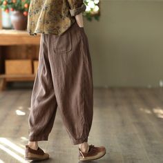 Details: Gender: Women Item Type: Pants Material: Linen Season: Spring, Autumn Pattern: Solid Style: Casual, Loose, Retro Waist Type: Elastic Waist Size: One Size Waist: 66.00 - 106.00 cm/ 25.98 - 41.73 " Length: 89.00 cm/ 35.04 " Hip: 134.00 cm/ 52.76 " Spring Comfortable Harem Pants, Spring Baggy Brown Pants, Comfortable Cotton Workwear Bottoms, Brown Baggy Pants For Spring, Baggy Brown Bottoms With Tapered Leg, Brown Baggy Tapered Leg Bottoms, Baggy Brown Tapered Leg Bottoms, Non-stretch Brown Ankle-length Harem Pants, Comfortable Cotton Workwear Pants