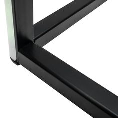 an image of a black metal frame with white light on it's side and bottom