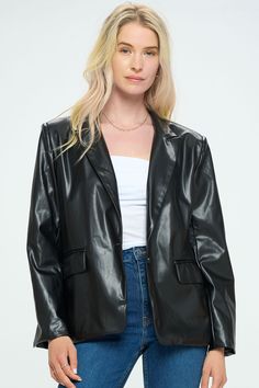 Crafted from soft faux leather and featuring a relaxed fit, this medium-weight blazer jacket gives you the edginess you crave. Product Details Material: 100% Polyester. Fit: True to size. Structured fit. Body length: 27" from shoulder to hem (size Small). Fabric: Faux leather with satin lining. Features: Single breasted stacked buttons, front pockets, shoulder pads, satin lining. Model: 5'9" / Wearing a size Small. Shipping & Returns Free Shipping on U.S. orders +$100. We want you to be 100% sat Leather Puffer Jacket, Jackets Women, Quilted Puffer Jacket, Classic Blazer, Tailored Blazer, Fit Body, Leather Blazer, Leather Jackets Women, Boyfriend Fit