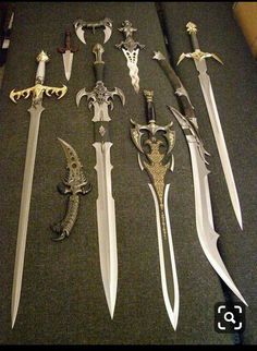 there are many different types of swords on the table