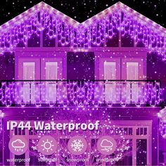 the front of a building with purple lights and snowflakes on it's windows