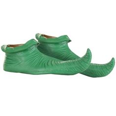 two green shoes that are sitting on top of each other in front of a white background