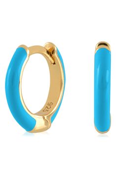 Easy-to-wear hoop earrings will add significant polish to even your most casual ensembles. 1/2" drop; 1/8" width Hinge with snap-post closure Sterling silver with goldtone plate/enamel Imported Blue Huggie Hoop Earrings For Pierced Ears, Blue Hypoallergenic Small Hoop Huggie Earrings, Hypoallergenic Blue Small Hoop Huggie Earrings, Trendy Nickel-free Blue Hoop Earrings, Hoop Huggie Earrings In Enamel, Blue Small Hoop Huggie Earrings For Everyday, Blue Huggie Hoop Earrings For Everyday, Blue Small Hoop Huggie Earrings, Everyday Blue Huggie Hoop Earrings