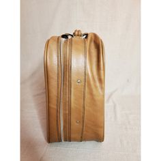 This is a lightweight faux leather suitcase most likely from the 1970's or early 1980's. It's most likely a design intended to emulate Samsonite luggage. There is some damage to the exterior from use, and some stains on the interior, which is to be expected with vintage luggage. Rectangular Travel Bag With Leather Lining, Vintage Leather Case For Business Trips, Vintage Leather Cases For Business Trips, Vintage Travel Bag With Leather Lining For Business, Vintage Travel Bag For Business With Leather Lining, Vintage Rectangular Travel Bag With Leather Backing, Vintage Brown Luggage For Trips, Retro Leather Briefcase, Retro Brown Briefcase