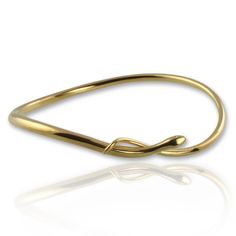 A striking, sleek snake slips seductively around your wrist before settling stylishly in position. Symbolically, serpents and snakes represent fertility or a creative life force. As snakes shed their skin they are symbols of rebirth, transformation immortality or healing. This impressive bangle can represent this or wear it simply because it catches your eye and will compliment any outfit - enjoy the admiration you will receive with this slinky serpent on your wrist! Measuring 3.5mm at it's wide Elegant Snake-shaped Bangle For Gift, Elegant Snake Shape Bangle Perfect For Gift, Elegant Snake Shape Bangle Gift, Elegant Flexible Snake-shaped Bracelet, Formal Snake-shaped Jewelry, Elegant Snake-shaped Bangle As Gift, Elegant Adjustable Snake Bangle, Snake Bangle, Serpent Jewelry