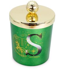 a green and gold canister with a golden s on the top that says southern