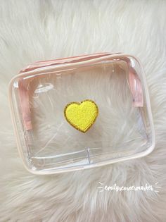 clear cosmetic bag//clear makeup bag//adhesive varsity letter patch//skincare bag//travel pouch//travel bag//heart//yellow//pale pink This clear varsity patch bag is the perfect summer staple! Use it as a makeup bag, cosmetic bag, at the beach, or while traveling! This pouch also makes a great gift! -trimmed in pale pink -yellow heart varsity patch -6x8 inches -clear zipper bag Skincare Bag, Clear Makeup Bag, Patch Bag, Clear Cosmetic Bag, Clear Makeup, Clear Makeup Bags, Varsity Letter, Yellow Heart, Toiletry Storage