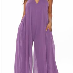 Very Pretty Flowy Jumpsuit (New In Package ) Halter Top-V-Neck-Backless-Wide Leg Pantsummer Is Around The Corner Ladies Come & Get It Beach V-neck Solid Color Jumpsuits And Rompers, V-neck Solid Color Jumpsuits And Rompers For Vacation, Solid Color V-neck Jumpsuit For Loungewear, Summer Solid V-neck Jumpsuits And Rompers, Purple Jumpsuits And Rompers For Spring Loungewear, Purple Jumpsuits And Rompers For Summer Vacation, Summer Vacation Purple Jumpsuits And Rompers, Purple Beach Jumpsuits And Rompers, Purple Sleeveless Jumpsuits And Rompers For Loungewear