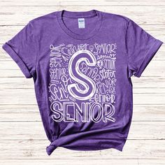 This Senior Typography Assorted Colors Tee is a great addition to your spirit wear collection. Also available in assorted colors and many different grade levels, it's perfect for sporting your school pride. Get one today! Click here for Senior primary colors listing. School T-shirt With Text Print And Relaxed Fit, School Spirit T-shirt With Text Print For Teacher Appreciation, School Spirit T-shirt With Text Print In Relaxed Fit, School Spirit Relaxed Fit T-shirt With Text Print, Text Print T-shirt For Teacher Appreciation, Relaxed Fit School T-shirt With Text Print, Relaxed Fit T-shirt With Text Print For School, School Spirit T-shirt With Name Print In Relaxed Fit, College Graphic Tee With Text Print