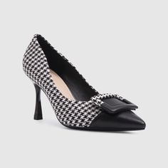 A pointy-toe pump with a flexible sole and comfy cushioning is styled with a curving topline that dips along the sides to show extra bits of skin. Color: Black Upper Material: Microfiber Sole Material: Non-slip Rubber Sole Heel Height: 3.94'' Slip-on Pointed Toe Office Heels, Slip-on Pointed Toe Heels For Office, Pointed Toe Office Heels, Synthetic Pointed Toe Heels With Contrasting Heel Counter, Slip-on Heels With Contrasting Heel Counter And Pointed Toe, Chic Black Pointed Heels, Black Synthetic Pointed Toe Court Shoes, Chic Slip-on Synthetic Court Shoes, Black Pointed Toe Slip-on Heels