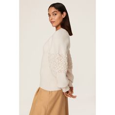 Off-white knit (64% Wool, 26% Polyamide, 9% Cashmere, 1% Elastane). Sweater. Mock neck. Long sleeves. Pull on. 24.5" from shoulder to hemline. Imported. White Feminine Knit Top For Fall, Feminine White Knit Top For Fall, White Spring Sweater With Ribbed Cuffs, White Ribbed Cuffs Sweater For Spring, White Sweater With Ribbed Cuffs For Spring, White Knit Top For Work In Winter, White Feminine Sweater For Fall, White Fine Knit Top For Spring, White Textured Knit Top For Workwear