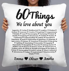 a woman holding a pillow with the words 80 things we love about you