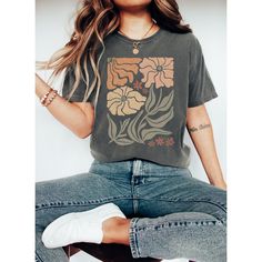 Step into a world of timeless beauty and natural charm with our Vintage Floral Boho Botanical Comfort Colors Shirt. Crafted with care and adorned with an array of delicate wildflowers, this shirt encapsulates the essence of the cottagecore aesthetic. Each flower, meticulously pressed, lends an air of vintage allure, while the soft, oversized fit ensures comfort for all-day wear. Perfect for those who find solace in the tranquility of a garden or the joy of tending to flourishing blooms, this shi Vintage Relaxed Fit T-shirt With Plants Print, Casual Green Tops With Plant Print, Botanical Short Sleeve Tops With Relaxed Fit, Nature-inspired Summer Tops With Plant Print, Nature-inspired Tops With Plant Print For Summer, Casual Tops With Vintage Print And Relaxed Fit, Summer Nature-inspired Tops With Plant Print, Casual Relaxed Fit Top With Vintage Print, Nature-inspired Cotton Top With Plant Print