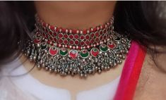 Handmade Banjara Mirror Choker Necklace, Beautiful Mirror Work, And Thread work, Antique Silver Look-Alike Necklace for Women, Gift for Women Add charm and charisma to your beautiful personality with these beautifully designed and handcrafted Brass necklace The antique finish gives this Necklace a very eye-catching look. Earrings are also designed beautifully and compliment the necklace very well. Wear it with any of your formal or casual outfits and grab compliments all the way! Red Motif Jewelry For Rituals, Red Motifs Jewelry For Rituals, Red Jewelry With Motifs For Rituals, Traditional Round Metal Choker, Bohemian Meenakari Choker As Gift, Vintage Meenakari Jewelry For Ceremonial Occasions, Vintage Choker For Festive Gift, Vintage Meenakari Necklaces For Wedding, Beautiful Personality