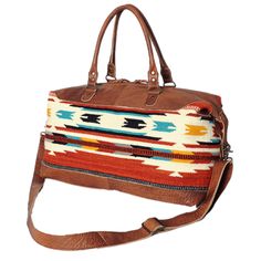 American Darling Muti-Color Aztec & Serape Brown Duffle Bag ADBG460I Style number: ADBG460I Brown genuine leather duffle bag Multi-color Aztec & serape print "American Darling" rectangle patch on front Two short leather carrying straps on top Removable and adjustable shoulder strap Two open pockets and one zipper pocket inside Metal feet on bottom for stability Zip closure 12 in X 20 in X 11in All item descriptions are taken directly from the manufactures, unless not available. Some of our items Saddle Blanket, Leather Duffle Bag, Leather Duffle, Brown Leather Strap, Best Bags, Duffel Bag, Weekender Bag, Leather Handle, Inside Pocket