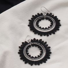 Eclipse Amazing handcrafted earrings, black (matte finish). Silver-plated details. - Colours: black - Length - 5.5сm (including earring silver-plated hook) - Width - 4.5сm - Total weight - 5.7 grams Please note that the actual colours may vary slightly from what you see on your screen due to monitor settings, which are beyond my control. Handmade Black Dangle Hoop Earrings, Black Beaded Round Earrings, Nickel Free Black Round Bead Earrings, Nickel-free Black Beaded Drop Earrings, Black Beaded Hoop Earrings Gift, Black Beaded Round Hoop Earrings, Handmade Black Round Earrings, Handmade Adjustable Black Hoop Earrings, Black Beaded Hoop Earrings For Party