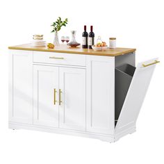 a white kitchen island with wine bottles and glasses on it's top, next to an open dishwasher