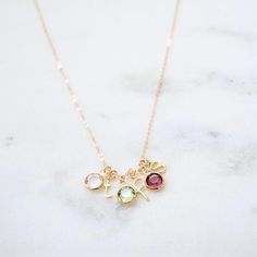 Personalized Birthstone Initial Necklace - Birthstone Necklace, Mommy Necklace, Gift for Grandma, Family Initials Necklace, Children's initial necklaceMake this necklace uniquely yours by customizing the initials and birthstones of the most important people in your life. An adorable necklace that is perfect to wear everyday.  Get it for yourself or give it to someone special for a thoughtful personal gift.Features:-------------- gold plated letters (lowercase only)- 14K gold filled chain- Swarov Birthstone Necklace For Grandma, May Birthstone Charms Necklace As Gift, Name Necklace For May Birthstone Gift, Elegant Name Necklace With Charms For Birthday, May Birthstone Name Necklace As Gift, Name Necklace For Birthday Gift With May Birthstone, Name Necklace For Birthday With May Birthstone, May Birthstone Name Necklace For Birthday Gift, Charm Necklace For Mom With May Birthstone