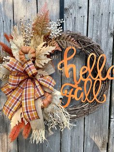 a wreath with the word hello fall on it