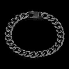 Material: Stainless Steel Color: Black Length: 9in Width: 0.5inWeight: 36grams 3-Year Warranty on All Watches Free Ground Shipping On Orders $149+ All Orders Ship Same Day or Next Day *In some instances, the colors in the images may slightly differ from the real product. Round Black Metal Chain Bracelet, Classic Adjustable Black Chain Bracelet, Formal Black Metal Chain Bracelet, Classic Black Stainless Steel Chain Bracelet, Classic Black Metal Chain Bracelet, Black Jewelry With Stainless Steel Clasp, Classic Black Chain Bracelet For Everyday, Classic Black Chain Bracelet For Formal Occasions, Elegant Black Cuban Link Jewelry