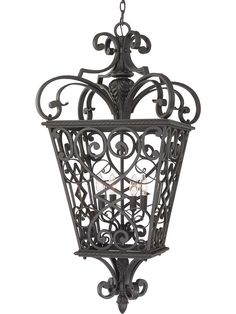 an ornate hanging light fixture on a white background