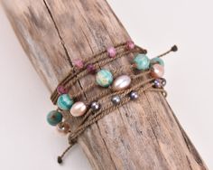 Not sure where to start your Tula Blue bracelet stack? You’ve come to the right place. Sit back, relax, & let us stack for you! Shop our curated collection of tried & true bracelet stacks.This 'Siren Song' Bracelet Stack includes:1. Banded Amazonite 8mm ($45)2. Blush Medium Rice Pearl ($50)3. Pink Tourmaline Riptide ($45)4. Peacock Pearl Riptide ($45)- Signature hand-spun Tula Blue ROPE- 100% waterproof, kid-proof, life-proof- One-size-fits-all sliding knot closure for custom fitOne more thing: Adjustable Stacked Jewelry For The Beach, Adjustable Turquoise Bohemian Pearl Bracelet, Stacked Adjustable Beaded Bracelets, Bohemian Stacked Bracelet Jewelry, Bohemian Style Adjustable Bracelet For Layering, Adjustable Stackable Turquoise Wrap Bracelet, Adjustable Hand Wrapped Beaded Bracelets, Adjustable Hand Wrapped Beaded Bracelets For Layering, Bohemian Bracelets For Layering