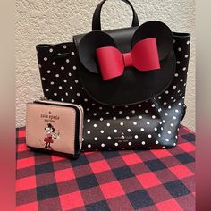 A Lightly Used Minnie Mouse Backpack Purse With Matching Wallet Pink Wallet With Dust Bag For Travel, Kate Spade Black Backpack With Removable Pouch, Cute Black Leather Bag, Kate Spade Black Backpack, Chic Kate Spade Bag As A Gift, Trendy Kate Spade Wallets For Travel, Cute Black Wallet For Daily Use, Trendy Kate Spade Travel Wallets, Kate Spade Bag With Removable Pouch As Gift