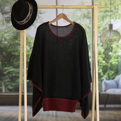 Easy elegance is captured in this design by Peruvian artisan Alfredo Falcon. Traditional textile work and modern design meet in this sweater. A touch of baby alpaca makes this classic black and burgundy sweater extra cozy. This top is completed with flowing kimono-style open sleeves that are synced in with a ribbed hem. Baby alpaca refers to the fine fleece from the season's first shearing. Alpaca Wool Sweater, Bohemian Sweater, Open Sleeves, Open Sleeve, Burgundy Sweater, Kimono Style, Streetwear Tshirt, Baby Alpaca, Kimono Fashion