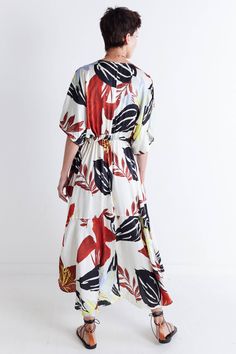 Say hello to sunny days with this one-of-a-kind dress, featuring a vibrant floral print and classic maxi silhouette. Style it heels or flats to dress up the look, or keep it more relaxed with sneakers or sandals. V-neckline Tie waist for adjustability Maxi length Side pockets *This item features an oversized fit. We recommend taking one size down in this style if a closer fit is preferred. Abstract Print Maxi Dress For Spring And Summer, Abstract Print Maxi Dress For Spring/summer, Spring Maxi Dress With Abstract Print, Summer Maxi Dress With Abstract Print For Spring, Spring Midi Dress With Abstract Print For Day Out, Spring Floral Print Patterned Midi Dress, Tropical Print Midi Dress For Spring And Summer, Red Abstract Print Maxi Dress For Summer, Red Abstract Print Summer Maxi Dress