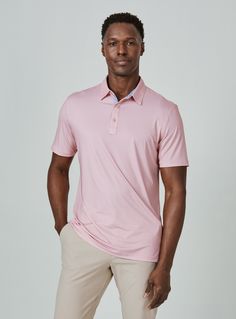 While our performance polos are ideal for functional movement, they are also stylish. The contrast edges add the signature 7DIAMONDS detail, while the fit will keep your comfort level optimal through out the day. Details Models is 6'1" and wears a size medium. Care: Machine wash cold on delicate cycle with similar colors. Do not use products containing bleach, oil or alcohol. Iron on low if needed. Hang to dry. Composition: 92% Polyester | 8% Spandex | 7DIAMONDS Men's Afton Polo Shirt in Dusty R Fitted Pink Sporty Polo Shirt, Pink Moisture-wicking Golf Top, Sporty Pink Polo Collar Top, Sporty Pink Collared Polo Shirt, Functional Movement, Men's Polo, Dusty Rose, Men's Polo Shirt, Bleach