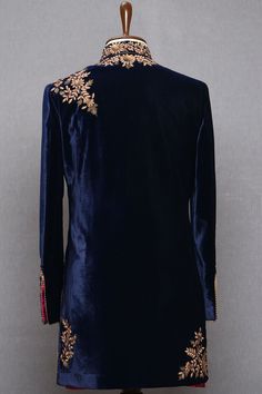 Blue Color Hand Embroidered Indo Western Jacket Fitted Party Outerwear With Intricate Embroidery, Festive Embellished Long Sleeve Sherwani, Festive Long Sleeve Embellished Sherwani, Fitted Sherwani With Intricate Embroidery And Long Sleeves, Designer Fitted Bandhgala With Floral Embroidery, Embellished Sherwani For Festivals, Fitted Long Sleeve Sherwani With Intricate Embroidery, Embellished Long Sleeve Nehru Jacket For Designer Wear, Long Sleeve Bandhgala For Parties And Festivals