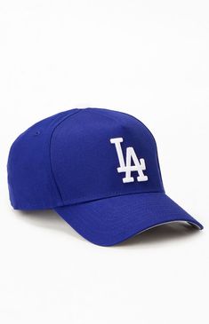 Gear up with the LA Dodgers 9FORTY Snapback Hat from New Era. This cap features a durable canvas construction with a slightly curved brim for a classic look. The front proudly displays LA Dodgers embroidery, complemented by breathable eyelets for added comfort. Finished with an adjustable snapback and New Era branding, it's a stylish choice for any Dodgers fan.Canvas constructionCurved brimBreathable eyeletsLA embroideryNew Era brandingAdjustable snapback closure New Era Mens LA Dodgers 9FORTY Snapback Hat - Blue La Dodgers Hat, Dodgers Hat, Dodger Hats, Dodgers Fan, North Dakota, Snapback Cap, Snapback Hat, Birthday Presents, Christmas List