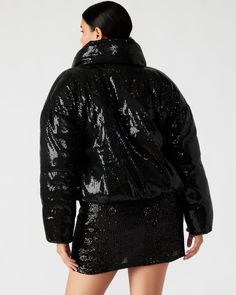 This STRATTO sequin puffer jacket features a zipper closure and long sleeves. The stylish design and high-quality materials provide both warmth and fashion-forward appeal. With a flattering fit and versatile design, this jacket is a must-have for any fashion enthusiast. Long-sleeved puffer jacket Sequin detailing Zipper closure Two functional front pockets Length: 22.5" 100% polyester Hand wash Eve is 5ft 9in and is wearing a size small Stephanie is 5ft 10in and is wearing a size large Imported Fashion Enthusiast, Care Label, Puffer Jacket, Stylish Design, Steve Madden, Must Haves, Fashion Forward, Puffer, Sequin