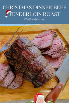 christmas dinner beef tenderloin roast on a cutting board