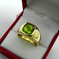 Gemstone: Peridot Treatments: Untreated Specifications: 9x9mm, approx. 3.20 carats Color: As shown Clarity: Eye clean, near flawless Cut: Cushion checkerboard cut Weight: 20 grams. Ring size: 10, with all sizes available from 6.5 through 12 This is as fine and elegant a man's ring as you will ever find. The perfect blend of a fine gemstone matched up with a clean classic 14K yellow gold ring. Good solid weight, nicely distributed to give the ring an even weight so that it will not spin. There is Gogh Paintings, Mans Ring, Mens Rings, Gold Cushions, Deco Floral, Yellow Gold Ring, Diamond Jewellery, Men's Rings, Bracelet Gold