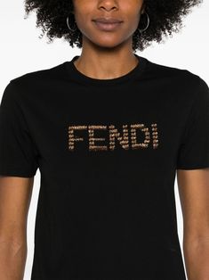 Looking for something comfy yet stylish? This lightweight cotton tee with its chic embroidered logo is your go-to for a day out. It's like your favorite cup of tea—simple, classic, and always reliable. Color: Black Material: 100% Cotton Features a crew neck and short sleeves Made in Italy Perfect for Spring/Summer 2024 Fendi Women, Leather Cap, Emilio Pucci, Denim Pant, Denim Top, Valentino Garavani, T Shirt Dress, Womens Clothing Tops, Cotton T Shirt