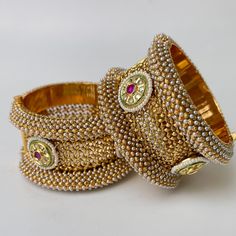 Gold plated Rajwadi Kundan openable Kada Bangle(1Pc)Single/Indian Kada/Wedding Jewelry/Kada/Punjabi Jewelry/Indian Wedding/Bollywood bangles Made from High-Quality Hand Picked Kundan Stone Perfect Kundan bangles for Party Wear. The Look Is Stunning And Preciously Suitable For All Kinds Of Dressy Occasions Its a Ideal Gift for Your Loved ones, Wife, Mother, Sister, Friend, Excellent gift for Birthday, Anniversary, Wedding , Can be wear any party , wedding, Festivals and Celebrations etc. This is 100% Handmade jewelry. So Color, shades, texture displayed may slightly vary from the actual product due to digital image limitations. We request you to consider these minor variations. Please expect the possibility of some slight imperfections when buying hand made jewelry. If you have any question Hand Set Bangle For Wedding And Diwali, Silver Bridal Bangle Sets For Festive Occasions, Hand Set Bangle For Wedding During Diwali, Bollywood Style Bracelets For Festive Wedding Occasions, Bollywood Style Bracelets For Festive Weddings, Bollywood Style Bracelets For Wedding And Festive Occasions, Bollywood Style Festive Bracelets For Weddings, Festive Hand Set Chandbali Traditional Wear, Bollywood Style Bangle For Diwali Wedding