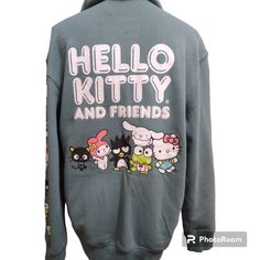 Sanrio Hello Kitty And Friends Green Teal Graphic Oversized Fleece Zip-Up Adorable Hoodie Sweater With All Your Favorite Characters: Hello Kitty, Badtz Maru, My Melody, Chococat, Keroppi, & Cinnamoroll! Drawstring Hoodie, Front Kangaroo Pockets. Materials: 60% Polyester, 40% Cotton. Size: Small Lay Flat Measurements Pit To Pit- 21" Length- 27" Sleeve Length- 22.5" Wsh-031 Cute Hoodie For Streetwear, Cute Hoodie Outerwear For Streetwear, Kawaii Winter Hoodie For Loungewear, Cute Streetwear Outerwear With Drawstring Hood, Cute Outerwear With Drawstring Hood For Streetwear, Hello Kitty Print Hooded Hoodie For Winter, Hello Kitty Print Winter Hoodie, Hello Kitty Print Hooded Winter Hoodie, Casual Hello Kitty Hooded Sweatshirt